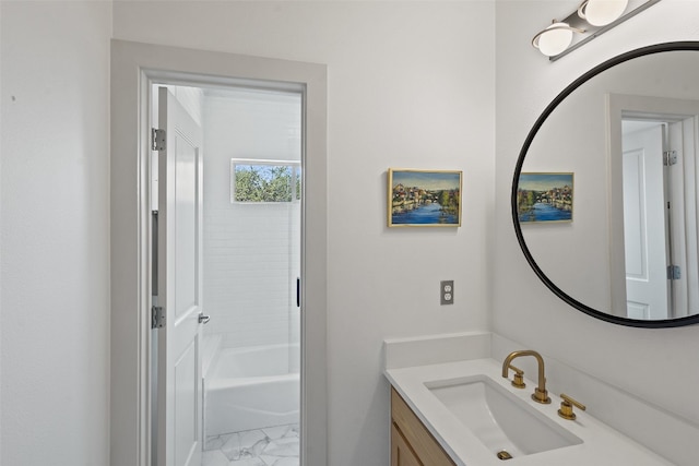 bathroom with washtub / shower combination and vanity