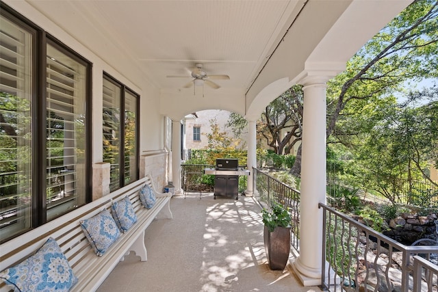 view of patio with ceiling fan and area for grilling