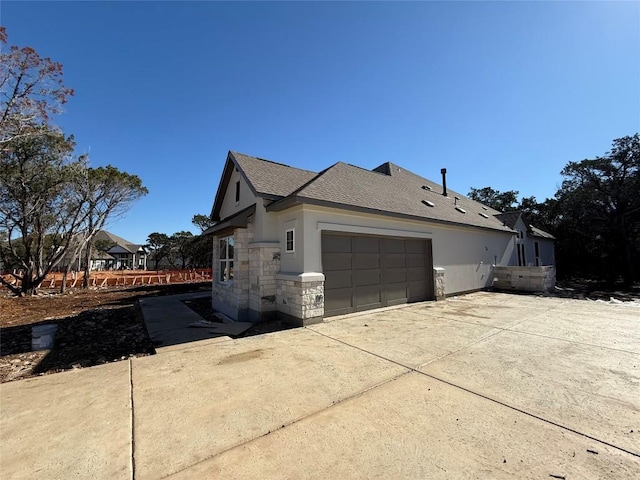 view of property exterior with a garage