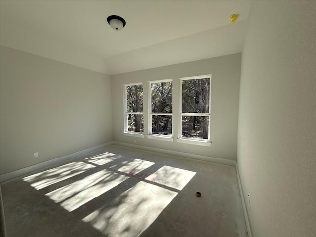 spare room featuring concrete flooring