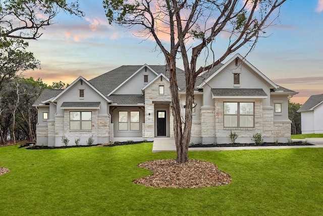 view of front of house with a lawn