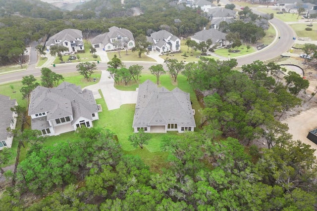 birds eye view of property with a residential view