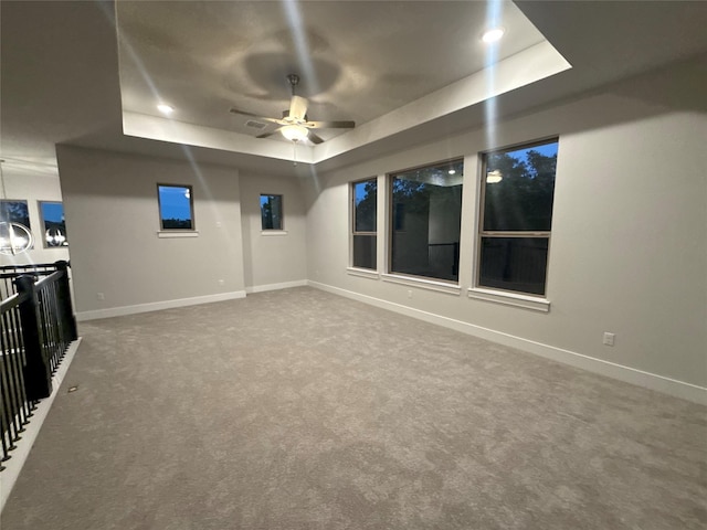 interior space featuring carpet flooring and ceiling fan