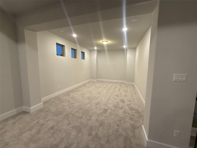 basement featuring carpet flooring