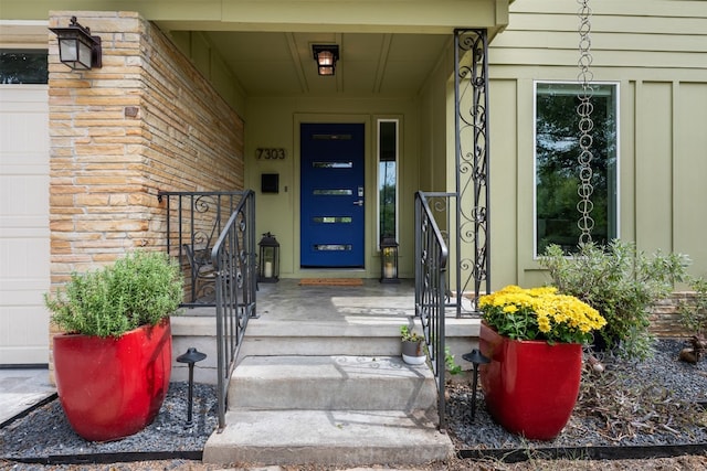 property entrance featuring covered porch