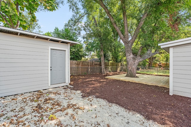 view of yard with a storage unit