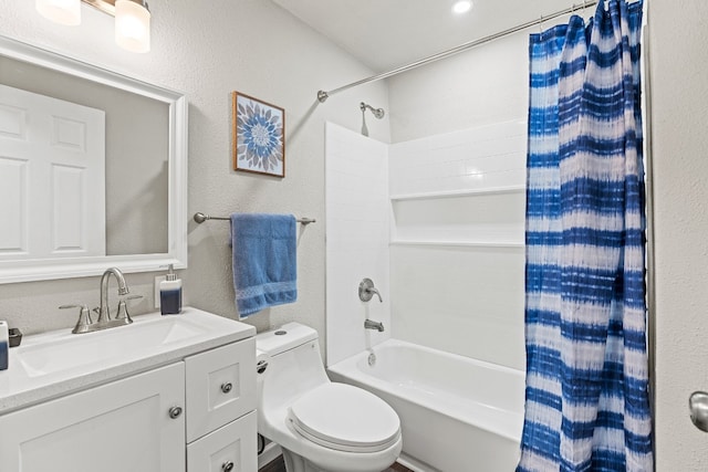 full bathroom featuring vanity, toilet, and shower / bath combo with shower curtain