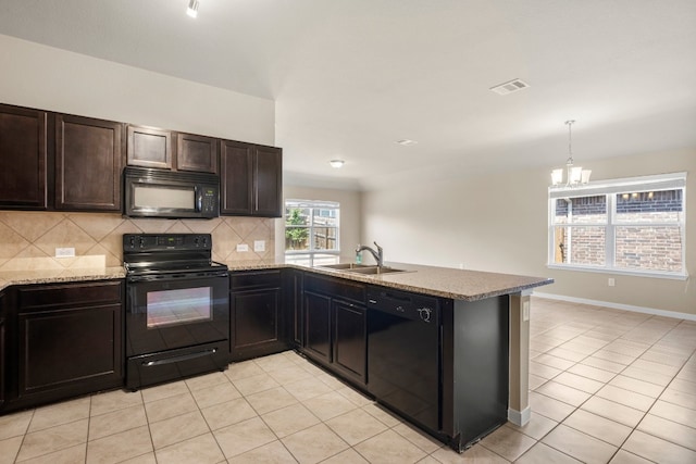 kitchen with decorative backsplash, light tile patterned flooring, kitchen peninsula, black appliances, and sink