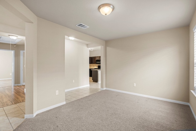 view of carpeted spare room