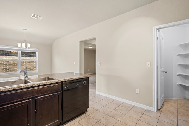 kitchen featuring light tile patterned flooring, black dishwasher, decorative light fixtures, sink, and a notable chandelier