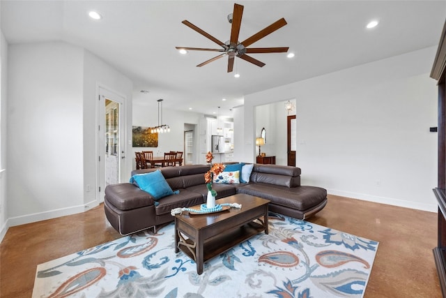 living room with concrete flooring and ceiling fan