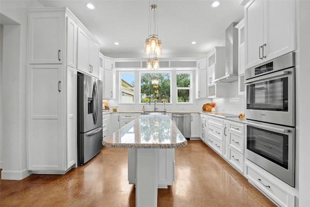 1323 Hi Cir N, Horseshoe Bay, TX 78657 - kitchen with appliances with stainless steel finishes, finished concrete floors, backsplash, wall chimney exhaust hood, and a kitchen island