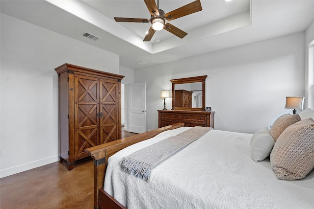 1323 Hi Cir N, Horseshoe Bay, TX 78657 - bedroom with finished concrete flooring, baseboards, a raised ceiling, and ceiling fan