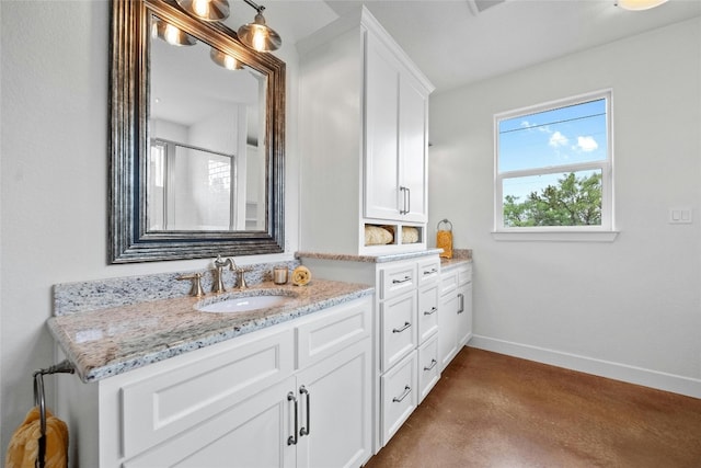 1323 Hi Cir N, Horseshoe Bay, TX 78657 - bathroom with concrete floors, baseboards, vanity, and a shower