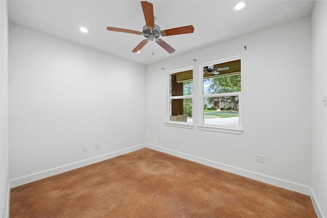 empty room with carpet flooring and ceiling fan