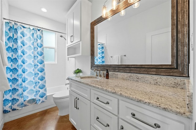 1323 Hi Cir N, Horseshoe Bay, TX 78657 - bathroom featuring vanity, shower / bath combo with shower curtain, toilet, finished concrete flooring, and recessed lighting