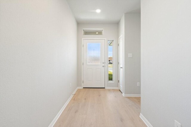 entryway with light wood-type flooring