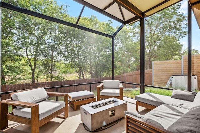 sunroom featuring lofted ceiling