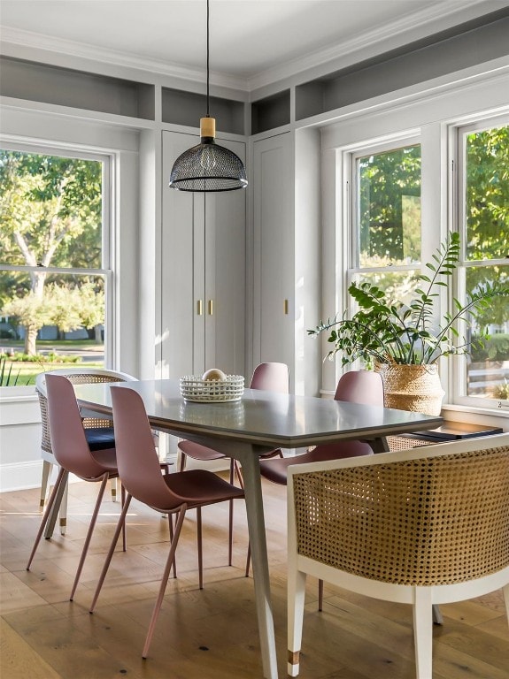 dining room featuring ornamental molding