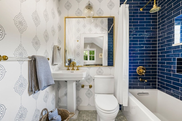 bathroom with toilet and shower / bath combination with curtain