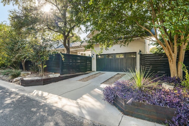 view of gate featuring a fenced front yard