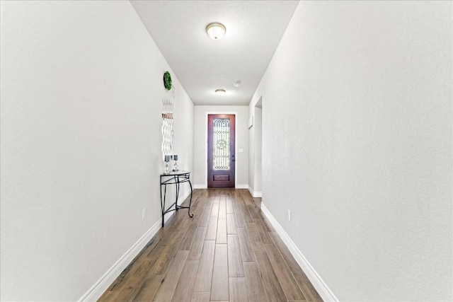 doorway featuring hardwood / wood-style flooring