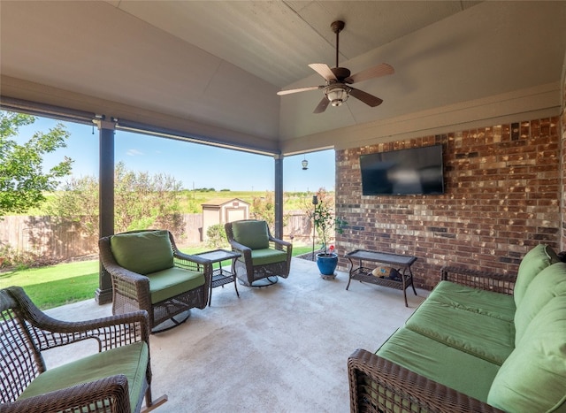 view of patio with ceiling fan and an outdoor living space