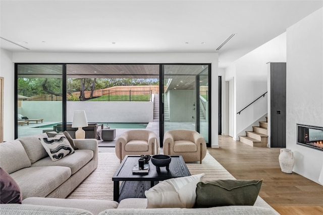 living room with light hardwood / wood-style flooring