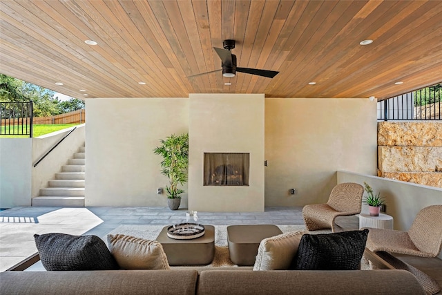 view of patio / terrace with ceiling fan and outdoor lounge area