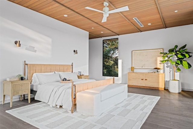 2400 Trail Of The Madrones, Austin, TX 78746 - bedroom with wooden ceiling, dark wood-style floors, and recessed lighting