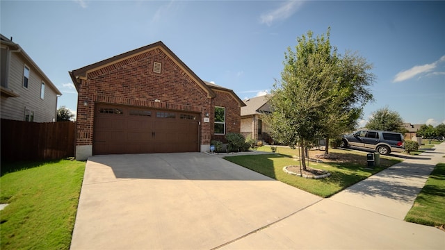 view of front facade featuring a front yard and a garage