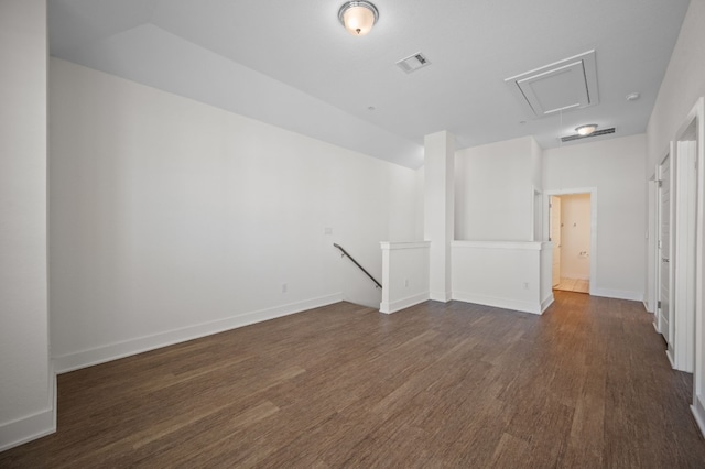 empty room featuring dark hardwood / wood-style floors