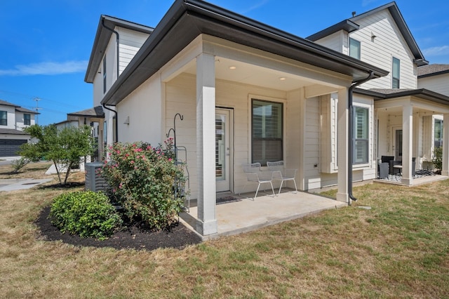 exterior space featuring a lawn and central AC