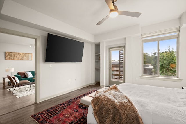 bedroom featuring ceiling fan and hardwood / wood-style flooring