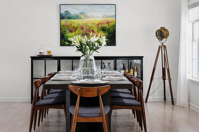 dining area featuring hardwood / wood-style floors