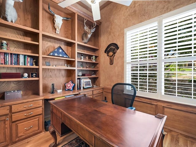 office space with ceiling fan and a wealth of natural light