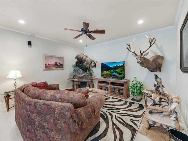 living room featuring ceiling fan and ornamental molding