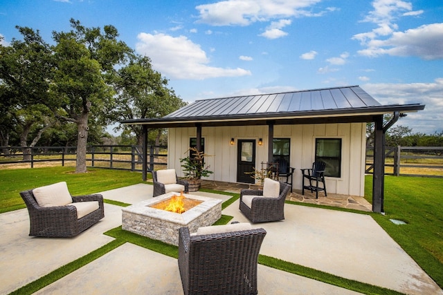 view of patio with an outdoor fire pit