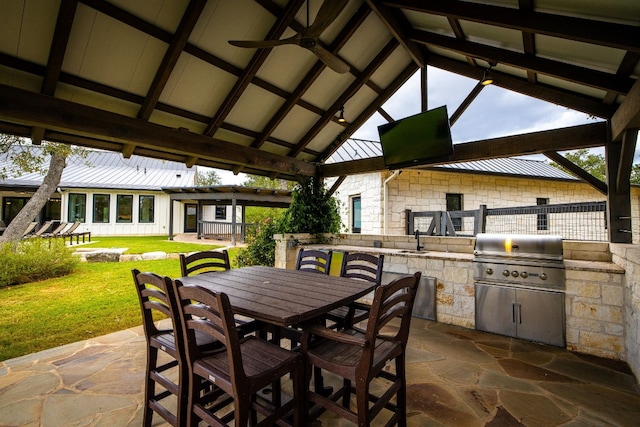 view of patio / terrace with a gazebo, sink, exterior kitchen, area for grilling, and ceiling fan