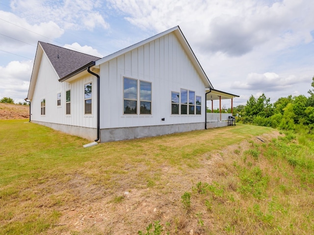 exterior space with a lawn