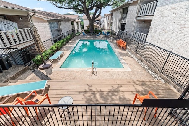 view of pool featuring a patio area