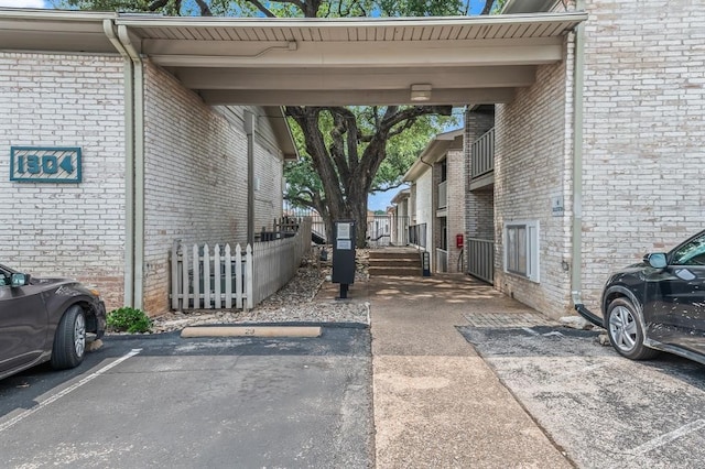 exterior space featuring a carport