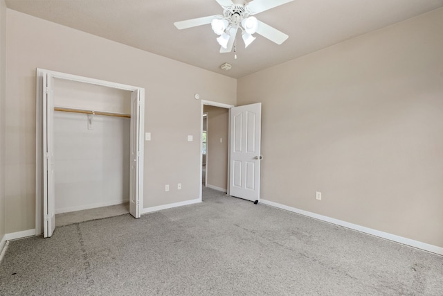 unfurnished bedroom with light carpet, ceiling fan, and a closet