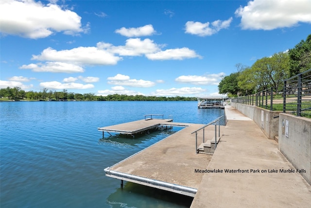 dock area with a water view