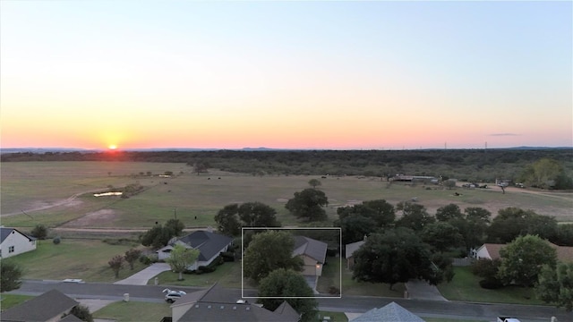 view of aerial view at dusk