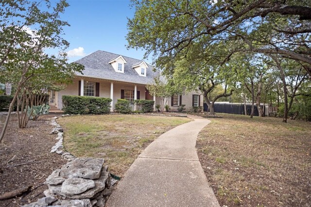 view of front of home featuring a front lawn