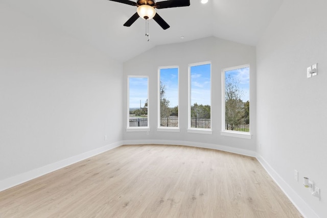 bonus room with vaulted ceiling, light wood finished floors, a ceiling fan, and baseboards