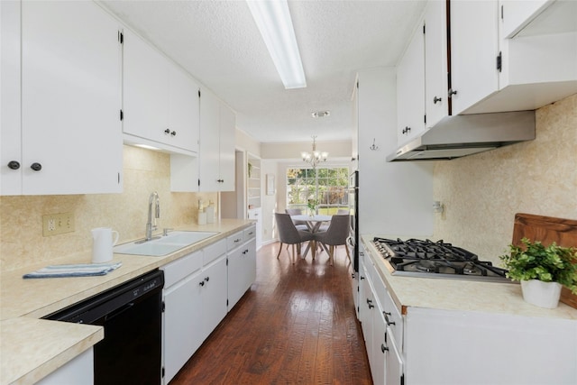 kitchen with white cabinets, dishwasher, dark wood-type flooring, and stainless steel gas cooktop