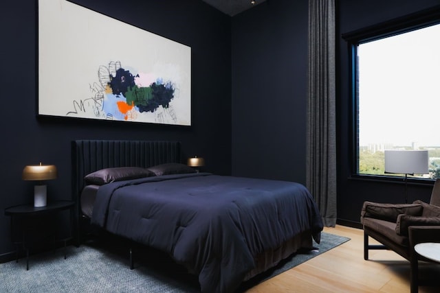 bedroom featuring hardwood / wood-style floors