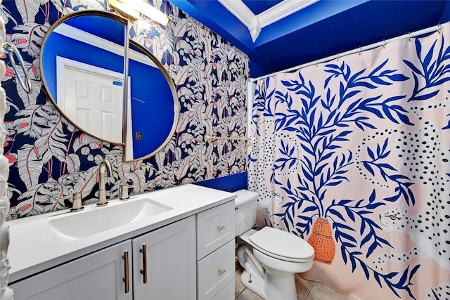 bathroom featuring tile patterned flooring, toilet, ornamental molding, vanity, and curtained shower